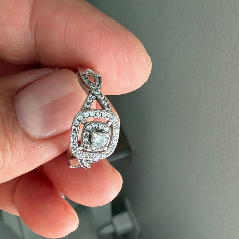 Elegant Silver Pendant with Crystals
